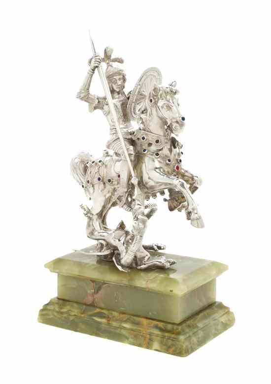 Appraisal: A Continental Silver Figural Group depicting St George slaying the