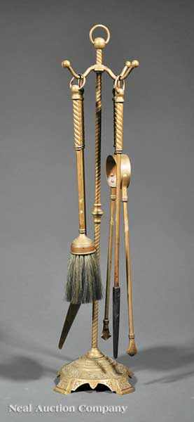 Appraisal: An American Brass Fire Tool Set spherule and ring-turned handles