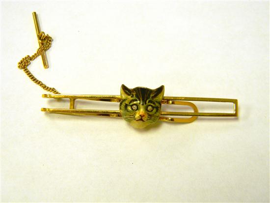 Appraisal: JEWELRY Enameled cat head tie bar K yellow gold enameling