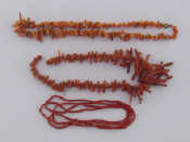 Appraisal: Three coral bead necklaces the first composed of small polished