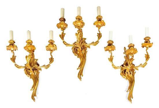 Appraisal: Three Louis XV Style Gilt Bronze Three-Light Sconces Height inches