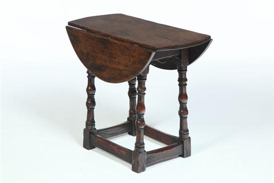 Appraisal: CHILD-SIZED JACOBEAN-STYLE DROP LEAF TABLE England th century oak Round