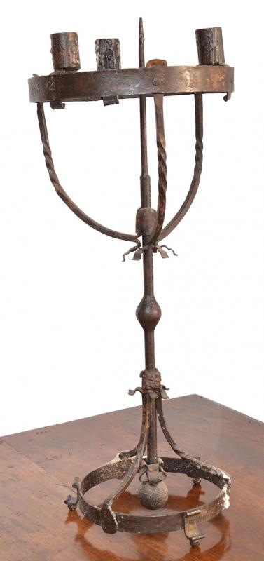 Appraisal: A PAIR OF SPANISH IRON TABLE CANDLESTICKS the single pricket