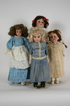 Appraisal: DOLLS - Lot of four A M dolls including a