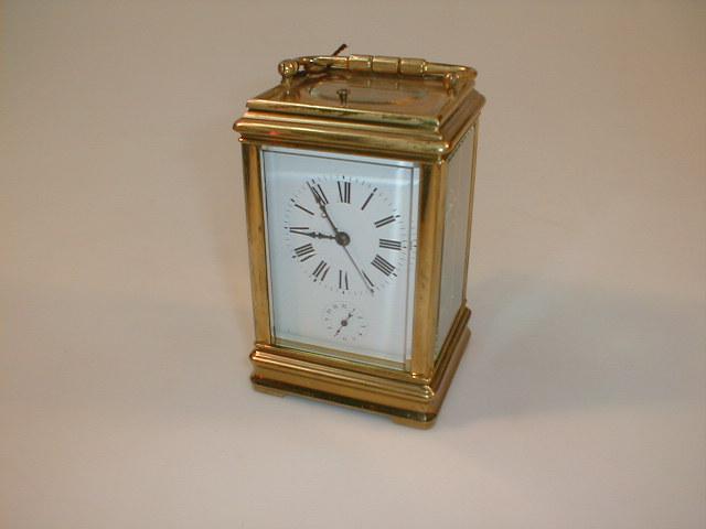 Appraisal: A gilt brass repeater carriage clock high