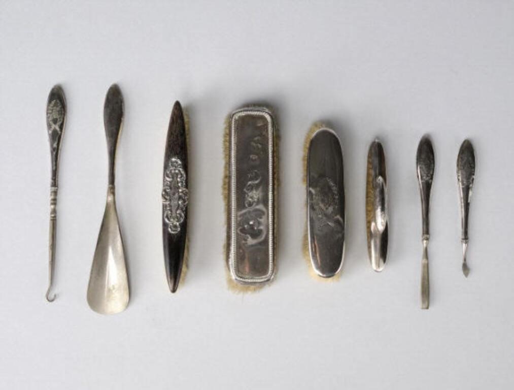 Appraisal: An eight-piece sterling dresser lot consisting of three clothes brushes