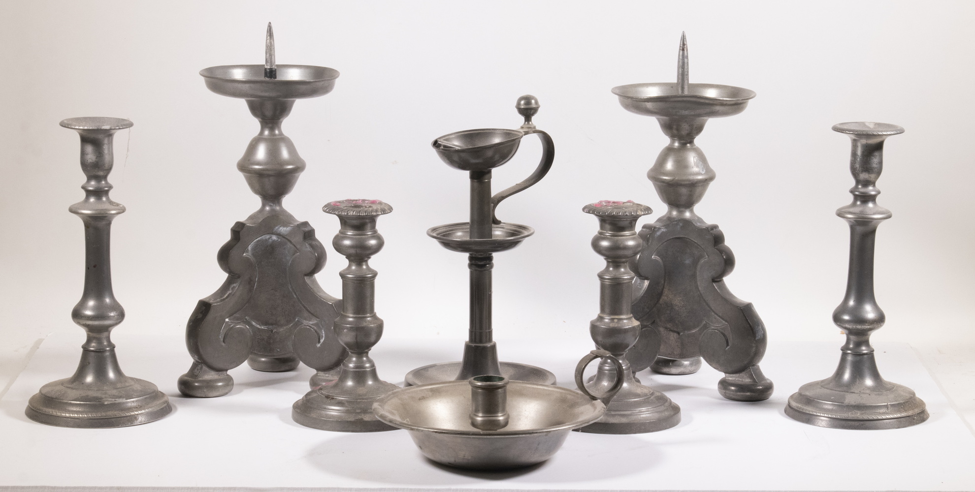 Appraisal: PEWTER CANDLES AND LANTERNS Lot of Assorted Pewter Lighting Items