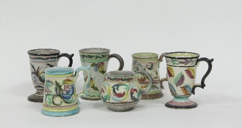 Appraisal: Denby Pottery A collection of hand painted jugs and mugs