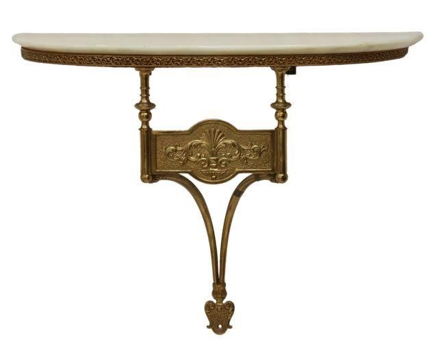 Appraisal: Italian gilt metal wall bracket th c demilune marble top