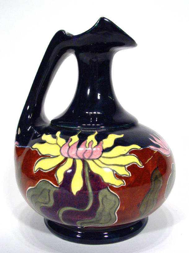 Appraisal: Old Morarion Austrian pottery ewer hand painted with stylised flowers