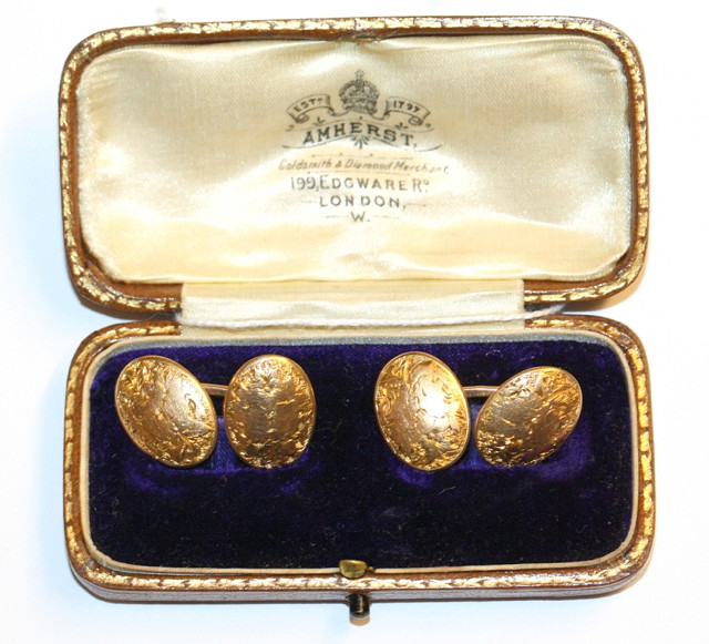 Appraisal: A CASED PAIR OF CT GOLD OVAL CUFFLINKS with engraved