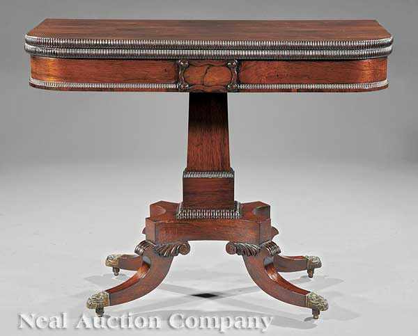 Appraisal: A Late Regency Carved Rosewood Games Table c foldover top