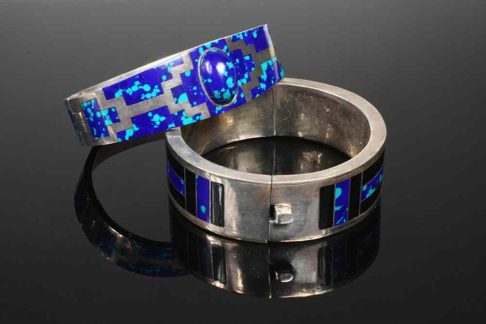 Appraisal: BRACELET SUITE - Contemporary wide Mexican silver bangle bracelets with