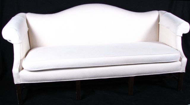 Appraisal: Chippendale style contemporary sofa with off white upholstery and single