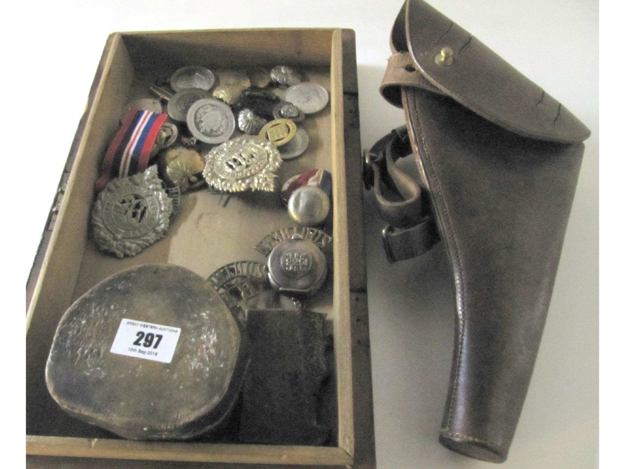 Appraisal: A lot comprising assorted medals badges and a pistol holder