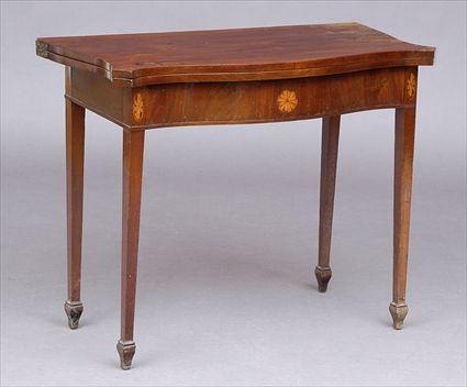 Appraisal: FEDERAL-STYLE INLAID MAHOGANY GAMES TABLE With serpentine folding top above