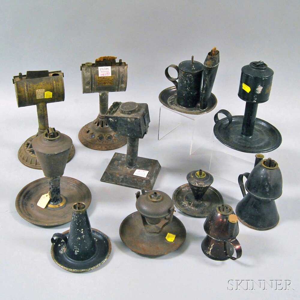 Appraisal: Eleven Early Tin Lighting Devices including lard lamps hand lamps