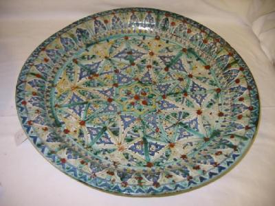 Appraisal: AN ISNIK FAIENCE CHARGER of circular form painted with geometric