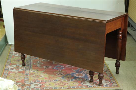 Appraisal: DROP LEAF TABLE Walnut with large rectangular leaves and turned