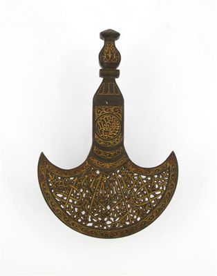 Appraisal: An Islamic axe head inlaid in gold with a continuous