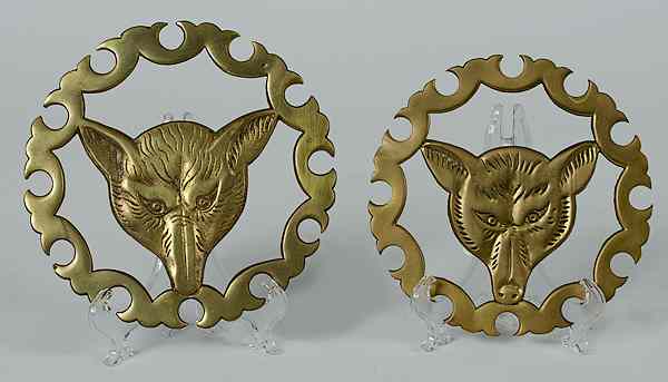 Appraisal: Brass Trivets with Fox Heads th century includes two brass