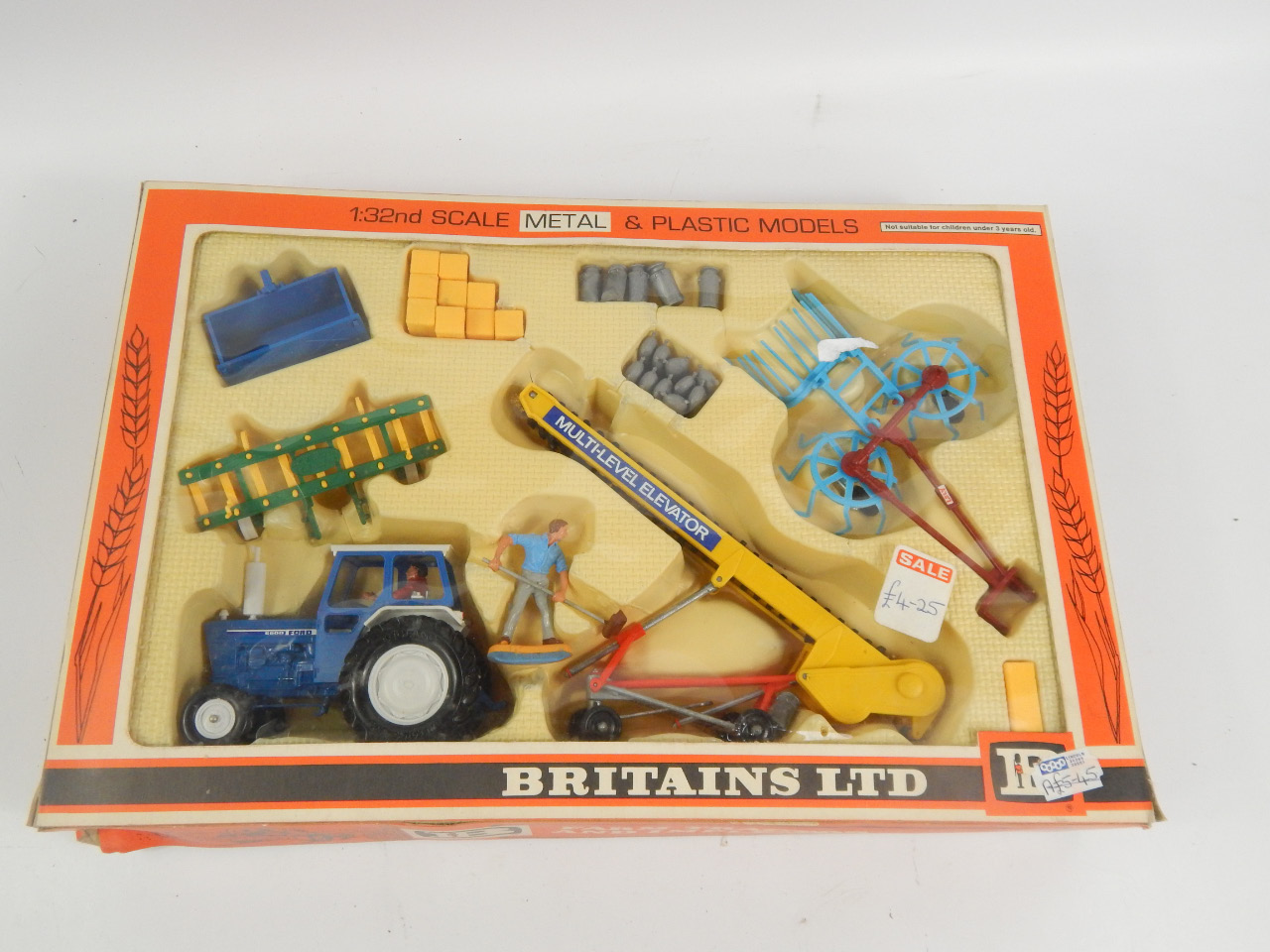 Appraisal: A Britains Limited boxed farm tractor and implements set to