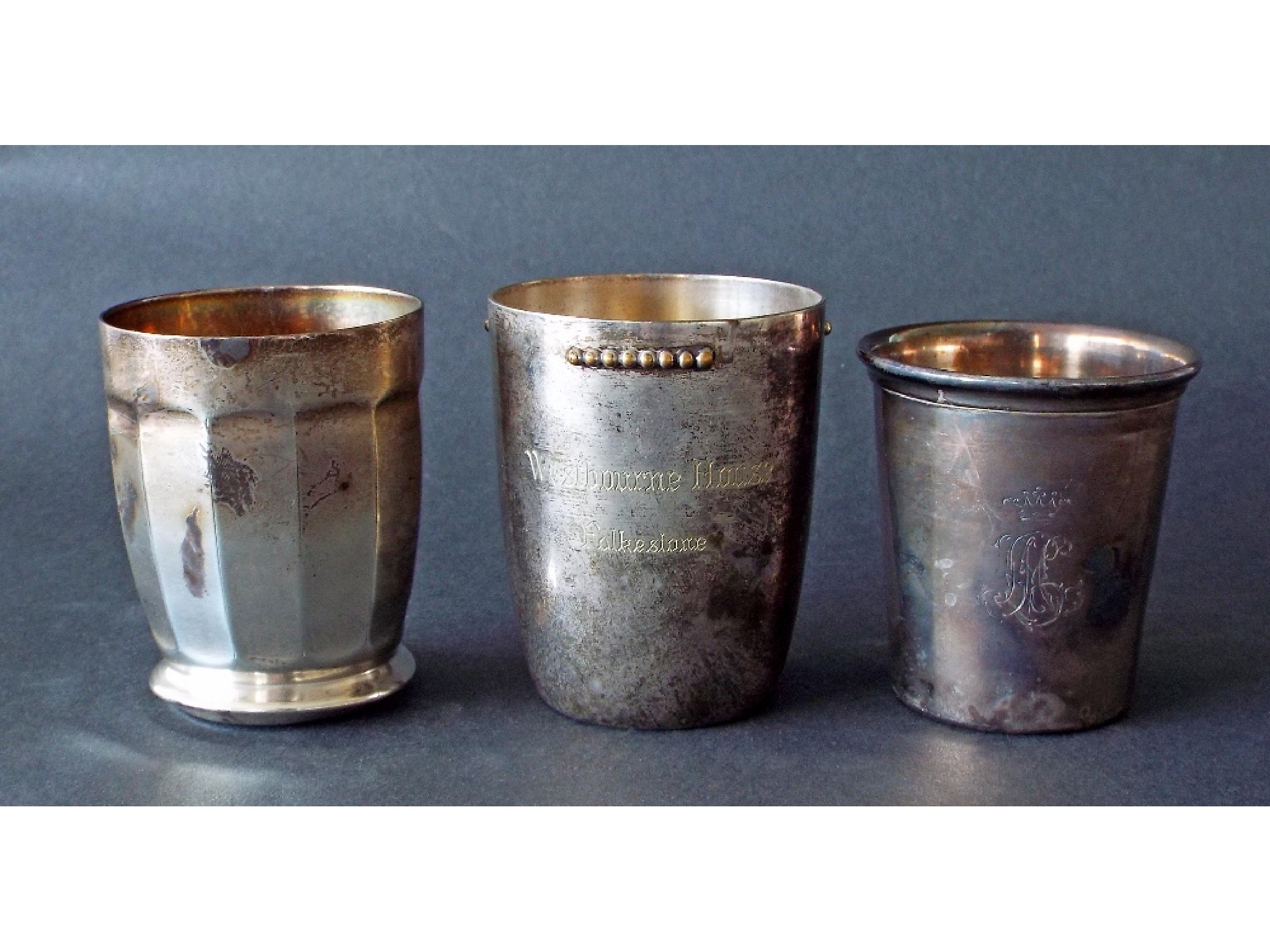 Appraisal: Three various Continental white metal beakers oz approx