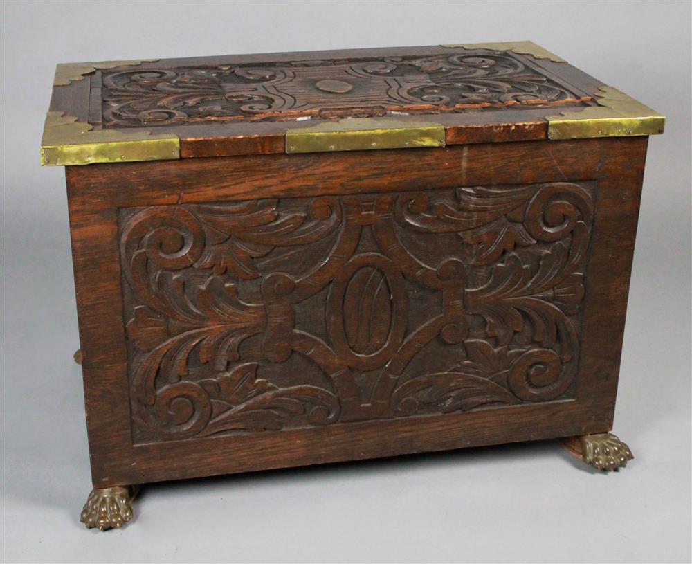 Appraisal: ENGLISH OAK CARVED BLANKET CHEST WITH BRASS MOUNTS having a