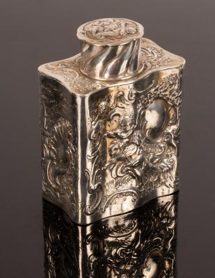 Appraisal: A Continental white metal tea caddy and cover embossed a