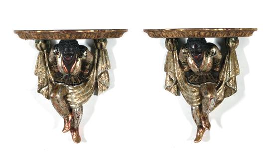 Appraisal: Pair gilt and painted carved wood blackamoor figural brackets H