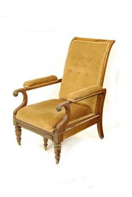 Appraisal: An early Victorian mahogany reclining open armchair with a pull-out