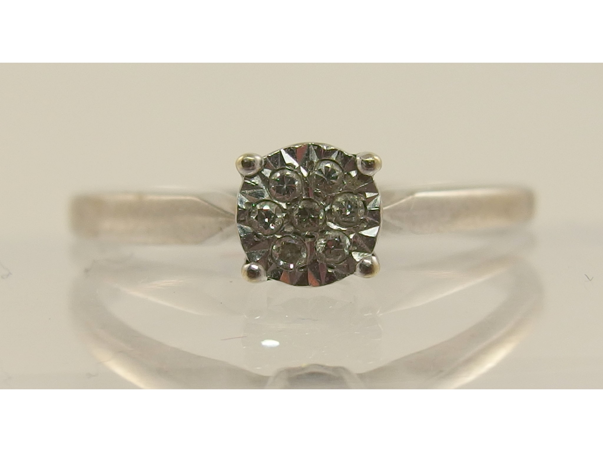 Appraisal: A ct white gold diamond flower ring