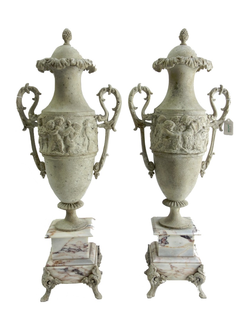 Appraisal: A pair of white painted metal two handled urns and