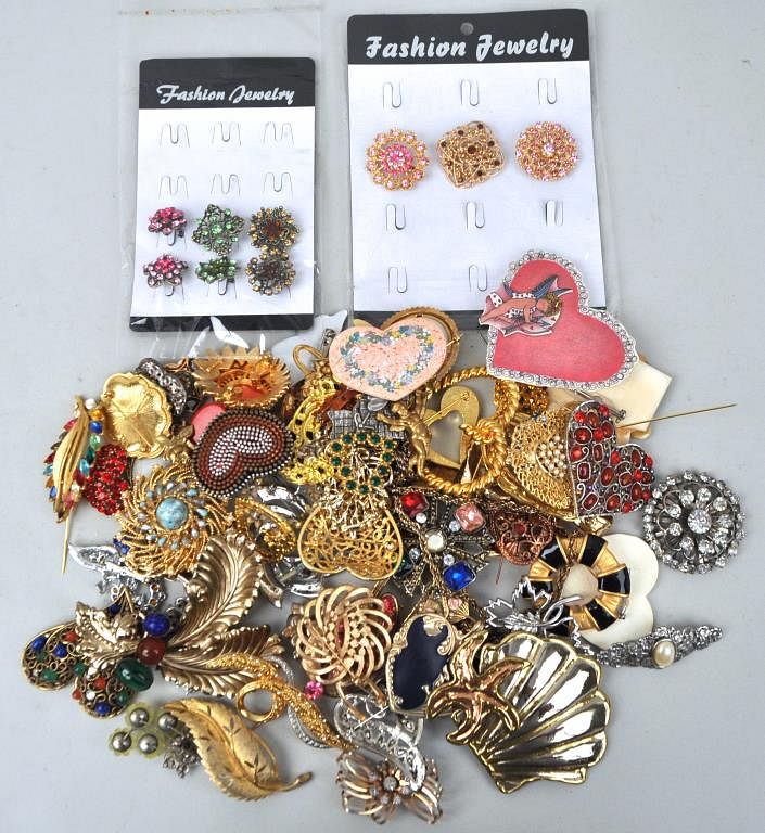 Appraisal: Discovery Group Costume Pins with use wear losses All jewelry