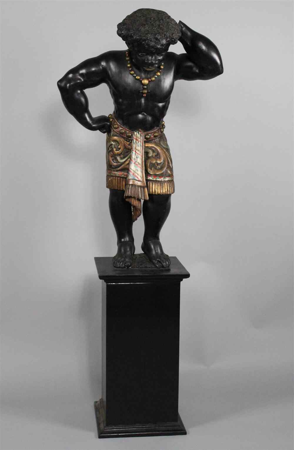 Appraisal: A POLYCHROME PAINTED BLACKAMOOR the muscular figure wearing a beaded