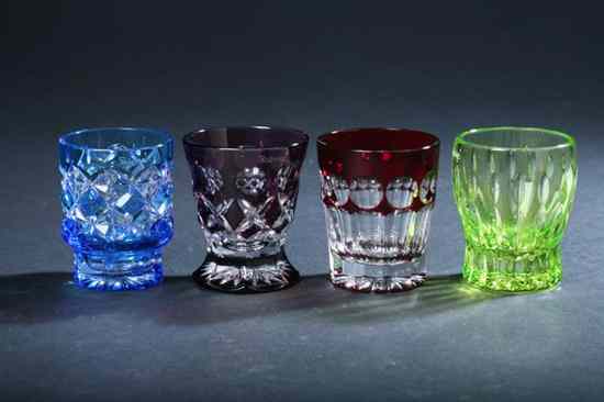 Appraisal: SET FOUR FABERG ''NA ZDOROVYE'' VODKA GLASSES In amethyst light