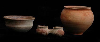 Appraisal: GROUP OF THREE EARLY PERSIAN VESSELS in and in diam