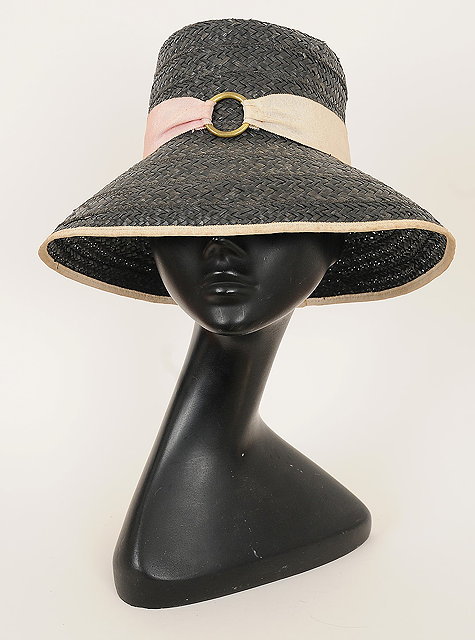 Appraisal: A s 'Breakfast at Tiffany's' style grey straw hat with