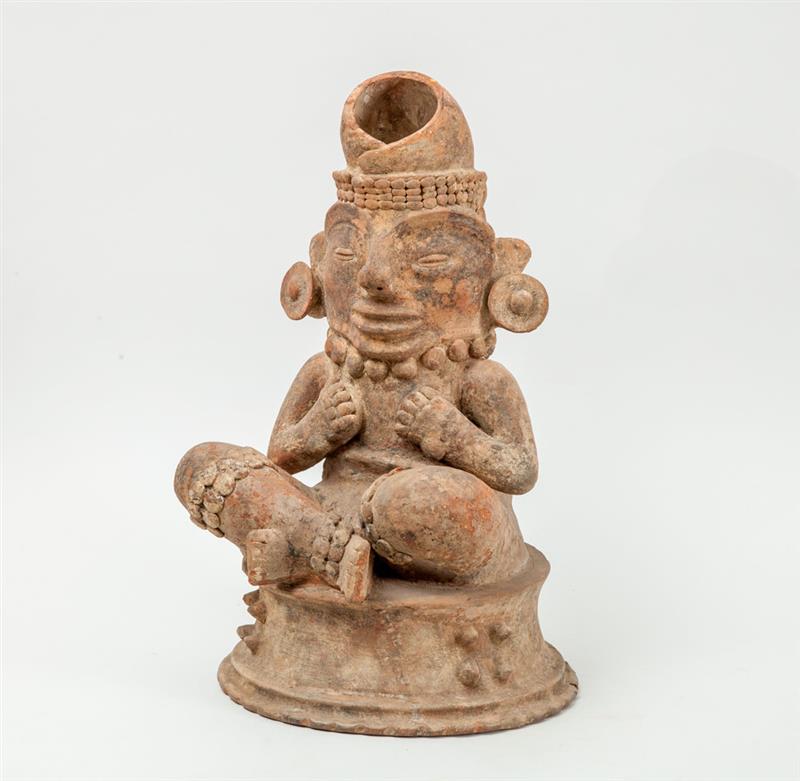 Appraisal: MAYAN STYLE POTTERY FIGURAL COVER TO AN INCENSE BURNER The