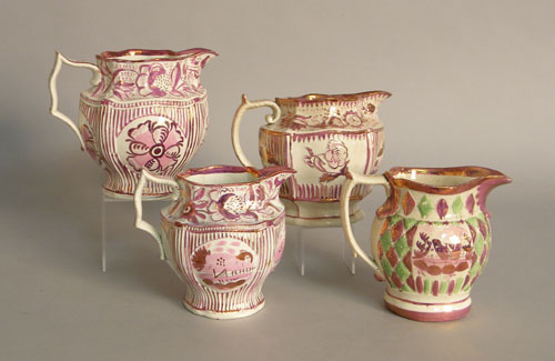 Appraisal: Four pink luster paneled pitchers two - h one -