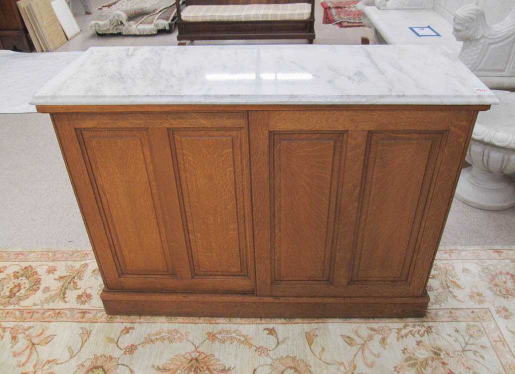 Appraisal: LATE VICTORIAN OAK STORAGE CABINET American c having a rectangular