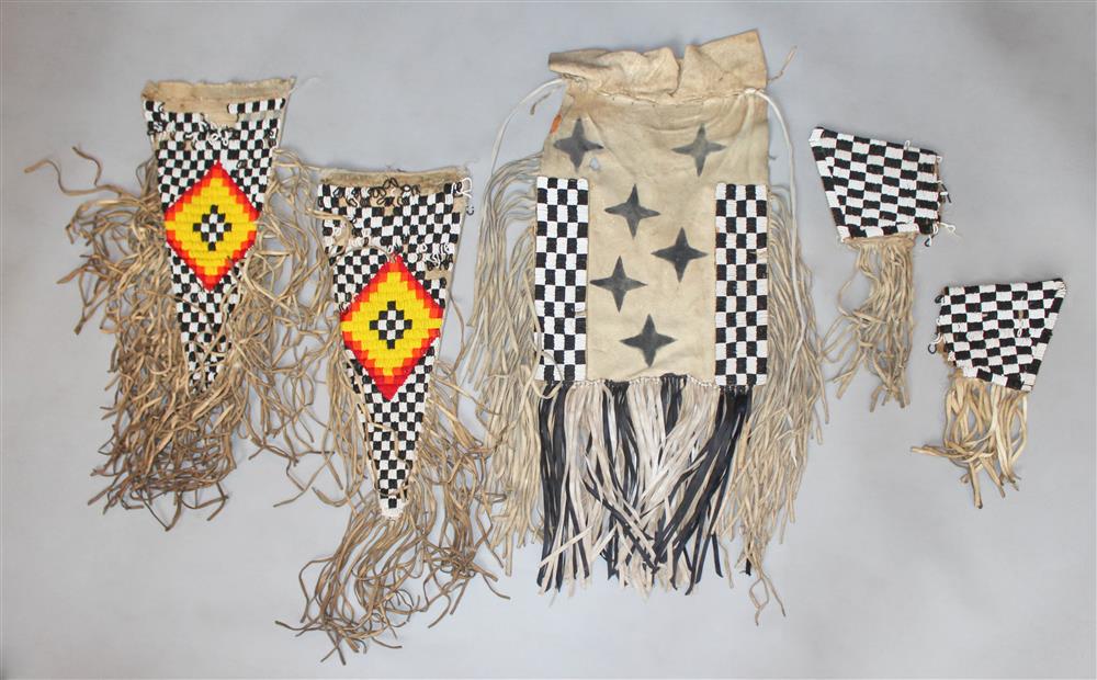 Appraisal: PLAINS BEADED REGALIA GROUP bead stitched garments of leather and