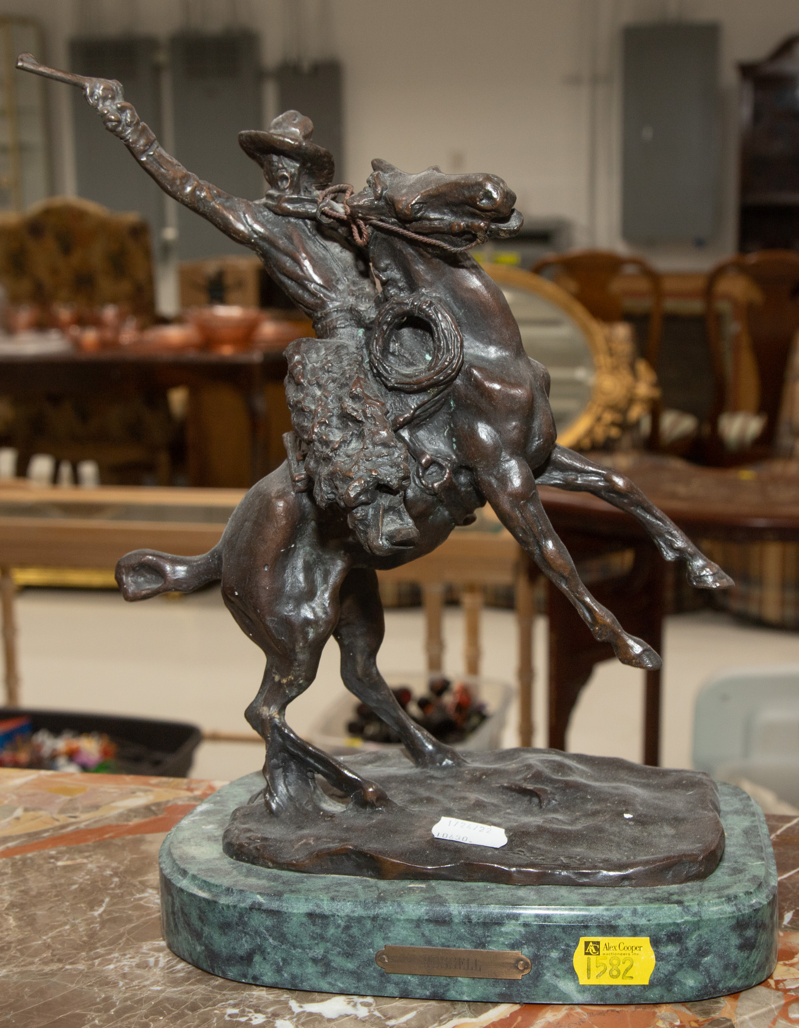 Appraisal: REPRODUCTION WESTERN BRONZE AFTER RUSSELL Late th century mounted on