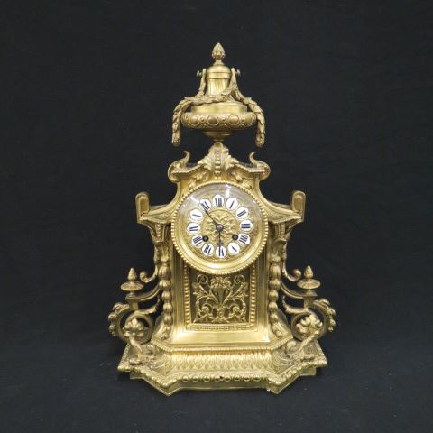 Appraisal: Ornate French Mantle Clock brass case enamel Roman Numerial markers