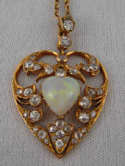 Appraisal: An antique carat gold heart shape opal and old brilliant