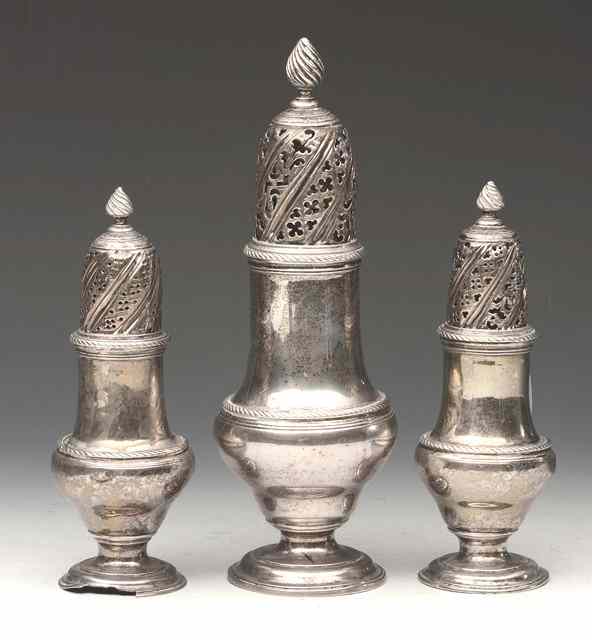 Appraisal: A GEORGE III SILVER BALUSTER SHAPED CASTOR with twisted rope