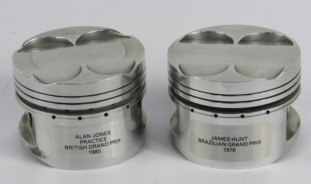 Appraisal: Two pistons from Formula One cars namely James Hunt Brazilian