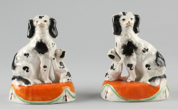 Appraisal: Pair of small staffordshire dogs black and white dogs seated