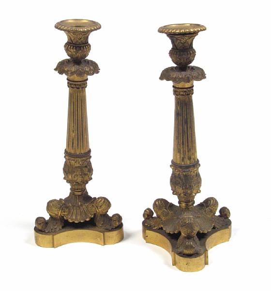 Appraisal: A pair of Empire style candlesticks th century height in