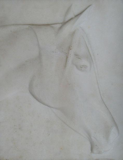 Appraisal: A WHITE MARBLE LOW RELIEF CARVING OF A HORSES HEAD